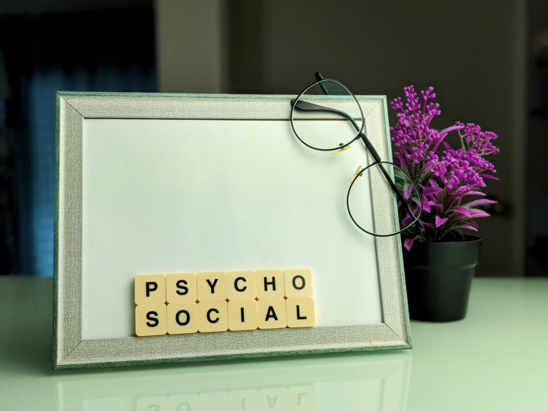 Alphabhet Pyshcosocial in the frame with a blur background. Alphabhet Pyshcosocial in the frame with a blur background