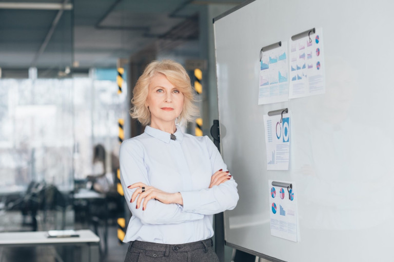 Confident business woman waist up. Arms folded. Successful top coach. Mentoring training inspiration motivation support. confident business woman arms folded top coach